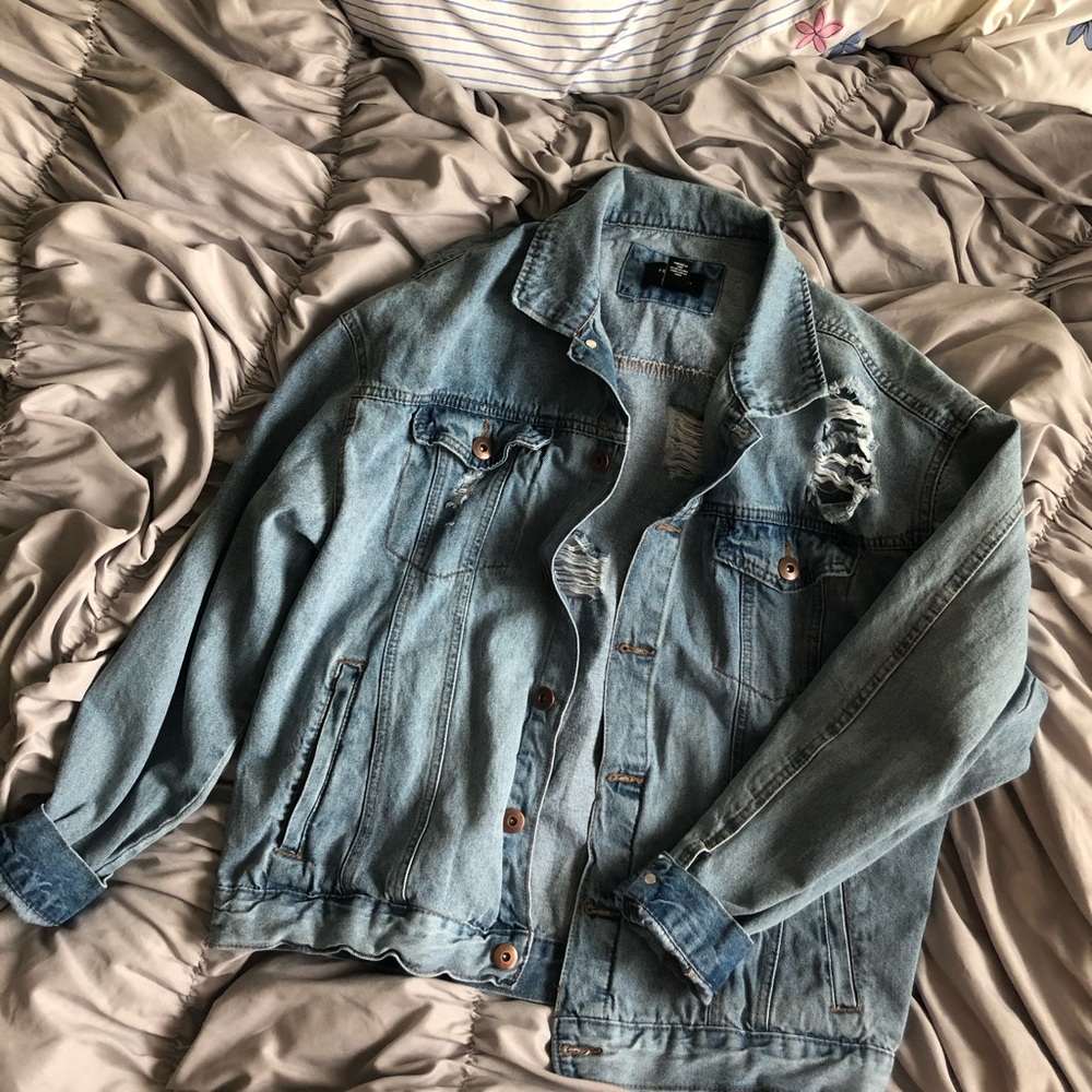 Ripped and washed jean jacket